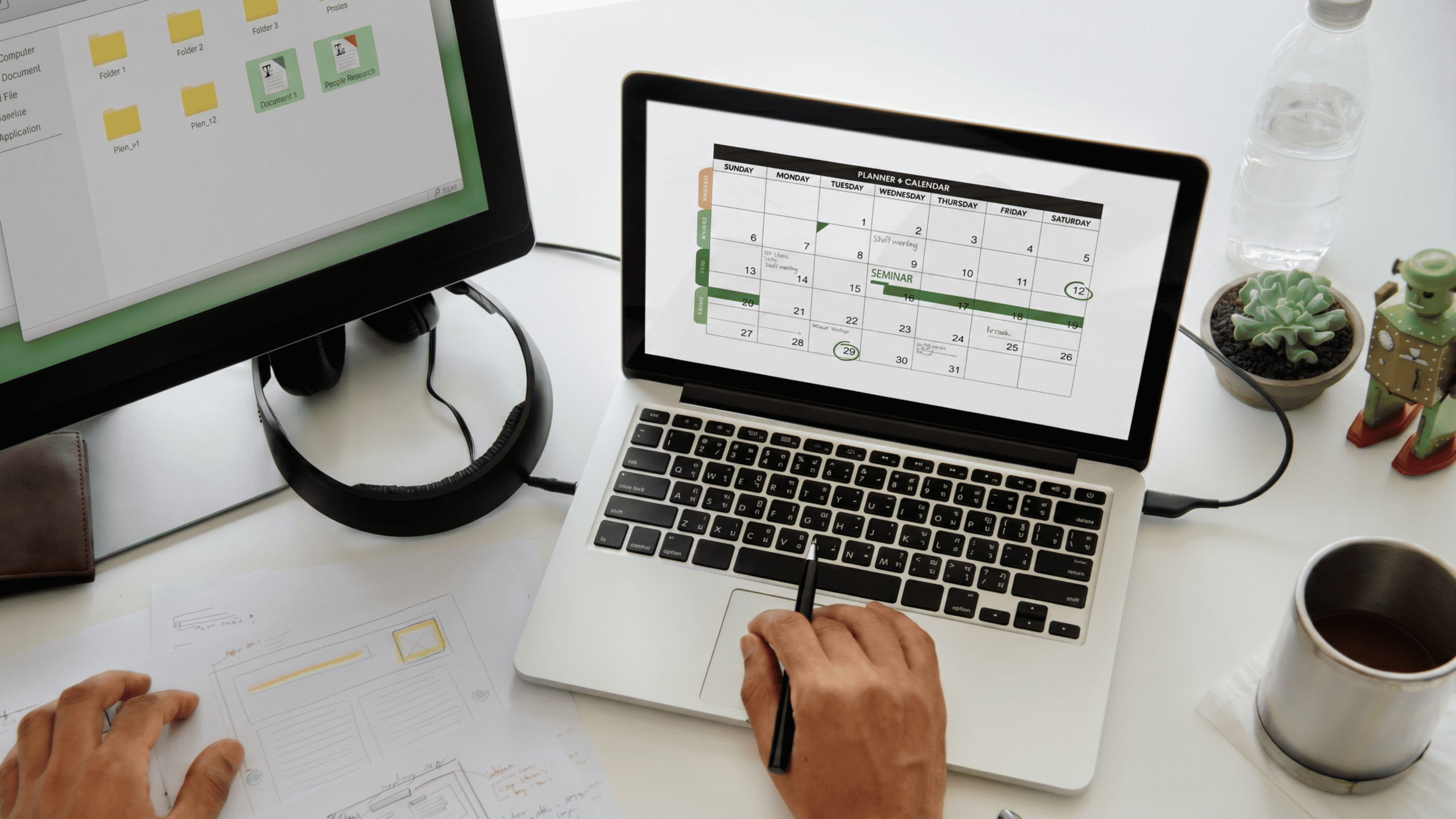 Professional managing schedule and tasks on digital calendar, showing organized business planning